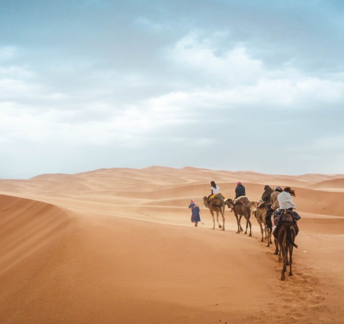 Riding camels Morocco desert tour